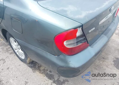 2004 Toyota Camry Le V6 z USA, uszkodzony, nr VIN 4T1BF32K74U071438